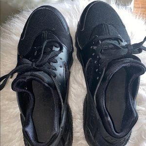 All black Nike huaraches